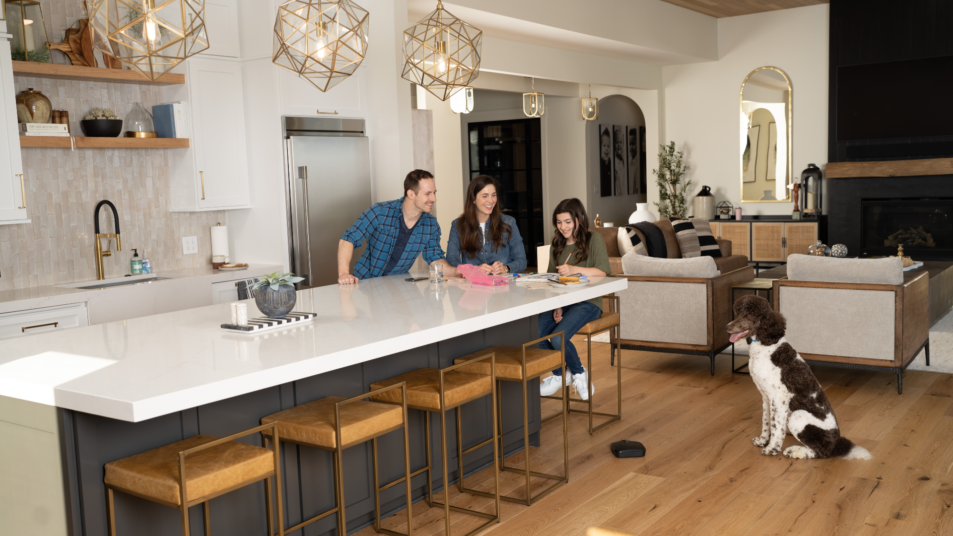 Family with dog in kitchen next to counter with dog displaying no counter surfing due to use of Invisible FenceSmartShields®